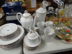 A quantity of Bavarian coffee & dinner ware comprising dinner plates, side plates, cups & saucers,