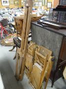 A vintage artist's easel & a pair of donkey easels, all from the studio of Welsh artist George