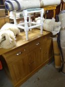 A modern sideboard, five rolls of modern carpets including sheepskin rug, an Italian-type musical