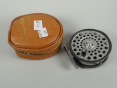 A Hardy Brothers LRH lightweight fishing reel in leather effect pouch Condition Report: please