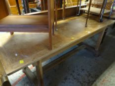 An early twentieth century Arts & Crafts-style oak refectory table in the Brynmawr / Cotswolds-