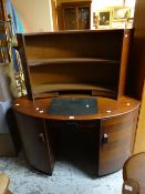 An unusual vintage oval kneehole desk together with a curved bookcase to match Condition Report: