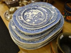 A quantity of willow platters & plates Condition Report: please request via email. Condition reports