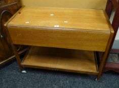 A mid-century drop flap tea trolley