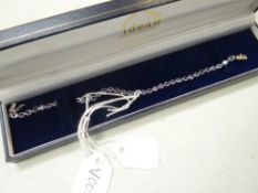 A tanzanite tennis-type bracelet (damage) Condition Report: please request via email. Condition