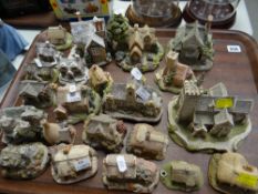 A quantity of Liliput Lane pottery ornamental cottages Condition Report: please request via email.
