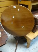 An antique mahogany tilt-top circular tripod table Condition Report: please request via email.