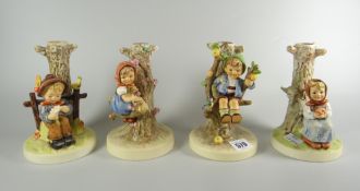A set of four Goebel figural spill holders Condition Report: please request via email. Condition