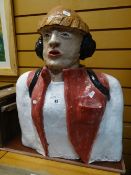 A modern painted pottery / concrete figure-head type bust of a workman wearing ear protectors