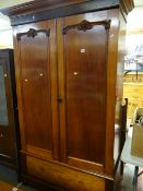 An antique mahogany two-door wardrobe, 206hx125wx57d cms. Condition Report: please request via