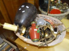 A wicker basket & contents including lamps, metalware ETC Condition Report: please request via