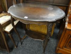 Early twentieth century stained two-tier occasional table together with set of four carved back