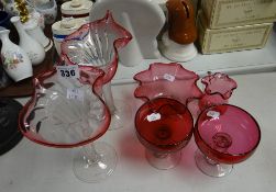 Two similar cranberry & clear glass Jack in the pulpit-type vases together with cranberry crimped