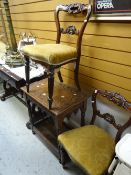 A carved oak two-tier table & a pair of carved balloon back chairs Condition Report: please