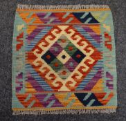 A Choli Kilim rug, 50 x 48cms