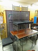 A modern glass-top dining table & four metal framed ladderback chairs Condition Report: please