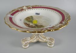 A Staffordshire porcelain cake stand with landscape scene titled to the base 'Loch Arkeg'