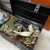 A vintage tin trunk containing a soldier's uniform & accessories including Sam Brown belt & tan