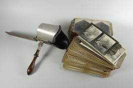 An excellent early twentieth century stereoscope slide package including goggle-type viewer together