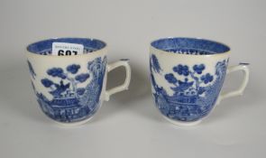 Pair of antique English teacups decorated in underglaze blue with Chinese landscape scenes Condition