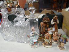 Three Bavarian carved peasant figure souvenirs, three Goebel figures, a continental figurine of a