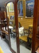 An Edwardian inlaid mahogany two-door mirrored wardrobe & similar dressing-table Condition Report: