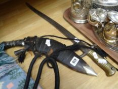 An early twentieth century sword-bayonet with brass handle, with markings possibly for the