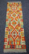 A vegetable dye wool Choli Kilim runner, 193 x 60cms