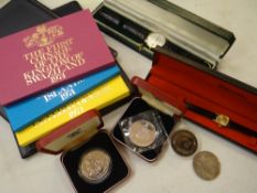 Two cased gents watches & a quantity of commemorative coinage Condition Report: please request via