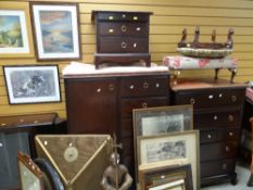 Four items of Stag Minstrel furniture & an oval mahogany dining table & four chairs Condition