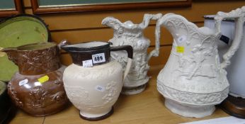 Group of four assorted jugs to include Ridgeway & Son hunting jug, Victorian relief figural jug,