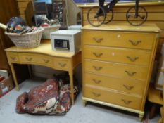 A vintage lightwood five-drawer chest & matching dressing table with tri-fold mirror together with a