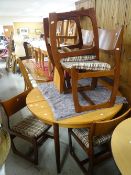 A very good mid-century G-Plan or G-Plan-style extending dining-table & six matching stylised