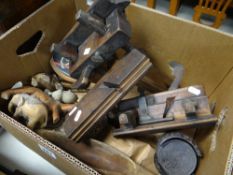 A box of moulding planes & wooden ornaments ETC Condition Report: please request via email.