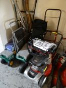 A Cobra overhead cam GCV 140 lawn mower together with further tools, step ladder, storage boxes ETC