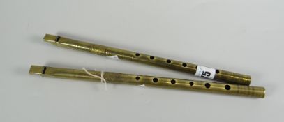 Two brass penny whistles by Joseph Wallis & Barnetts Samuel & Sons Condition Report: please