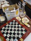 A parcel of mixed items including two glass decanters, Oriental chess set, dressing table set ETC