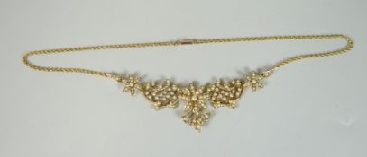 15CT YELLOW GOLD SEED PEARL PENDANT ON CHAIN, the five section pendant of floral and foliate