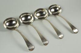 SET OF THREE GEORGE IV SILVER LADLES, London 1823 makers mark W E, together with another similar