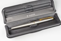 MODERN STAINLESS STEEL PARKER 45 FLIGHTER FOUNTAIN PEN with gold plated trim, in original box