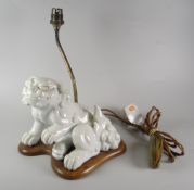 CHINESE BLANC DE CHINE STUDY OF A SEATED LION DOG on later wooden table lamp base. 14.5 cm high