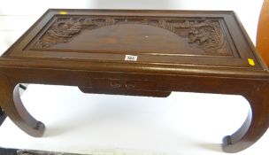 20th CENTURY CARVED HARDWOOD RECTANGULAR COFFEE TABLE overall carved in Oriental-style, depicting