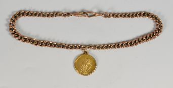 9CT GOLD PENDANT DEPICTING THE VIRGIN MARY on 9ct gold flat curb link chain, 22 grams approx.