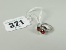 18CT WHITE GOLD TWO-STONE GARNET TWIST SHANK RING 2.8grams approx. Condition Report: good overall