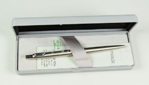 MODERN STAINLESS STEEL PARKER CLASSIC FLIGHTER BALLPOINT PEN with chrome trim, date stamped 1998, in