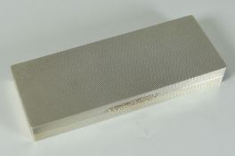 ELIZABETH II SILVER RECTANGULAR BOX having overall engine turned decoration and silver gilt