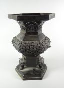 CHINESE BRONZE HEXAGONAL VASE raised on three lion dog mask feet, on hexagonal platform base,