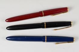 THREE VINTAGE PARKER SLIMFOLD FOUNTAIN PENS each with an original 14ct nib & gold plated trim, one