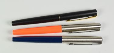 THREE MODERN PARKER '15' FOUNTAIN PENS one each of blue & neon orange - both with stainless steel