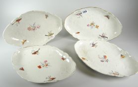 SET OF FOUR 19th CENTURY CONTINENTAL PORCELAIN HAND PAINTED OVAL SERVING PLATES painted with